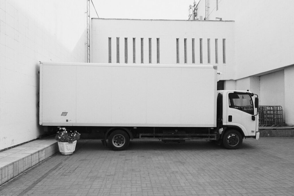 Moving truck loaded for an out-of-state relocation after a fast Long Island home sale