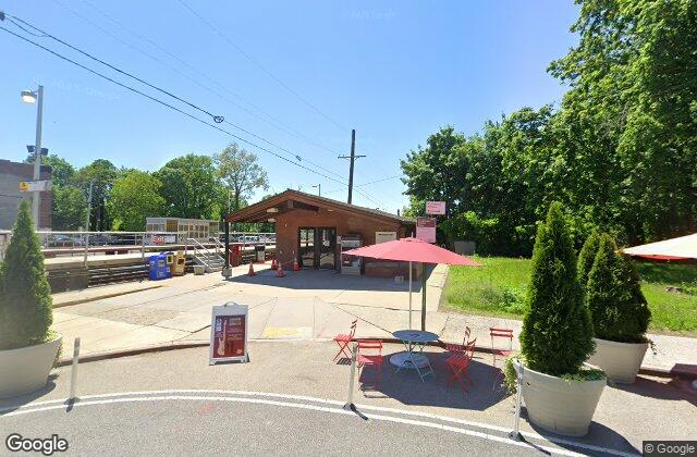 Street view of Douglaston LIRR Station in Douglaston NY where EZ Home Buyers pays cash for houses