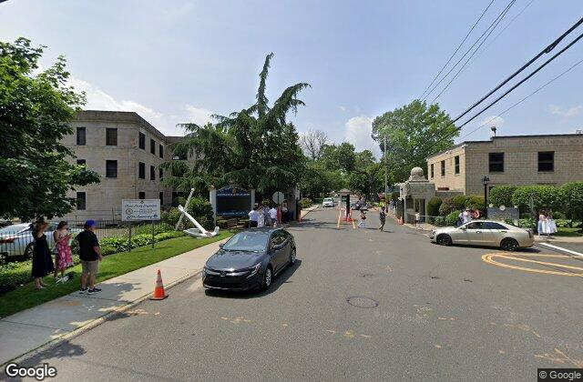 Street view of United States Merchant Marine Academy in Kings Point NY where EZ Home Buyers pays cash for houses