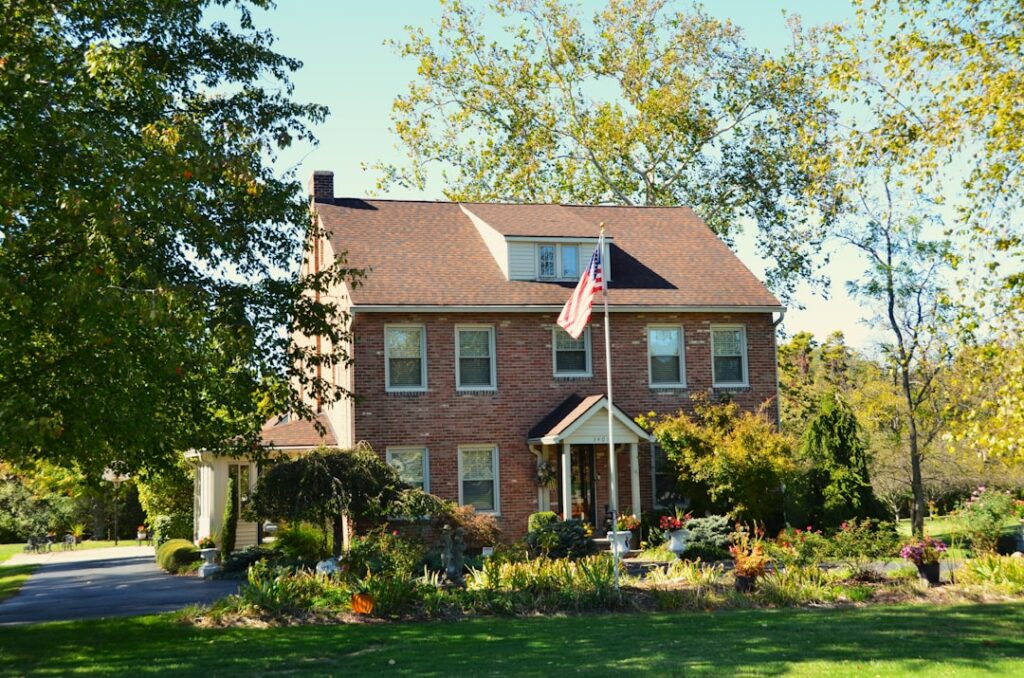 Suburban house whose owner is weighing a cash buyer against listing with a realtor