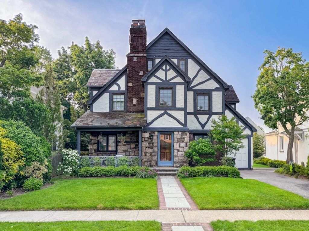 Tudor style single family house, the kind of tenant occupied rental we buy in the NY metro