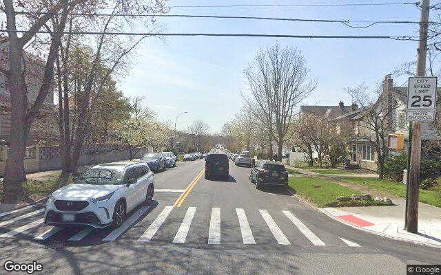 Residential street of brick homes in Flushing, Queens, NY