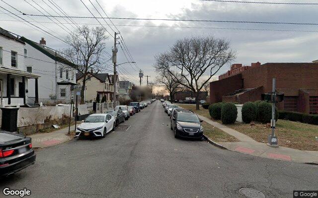 Two family homes on a residential street in Mount Vernon, NY