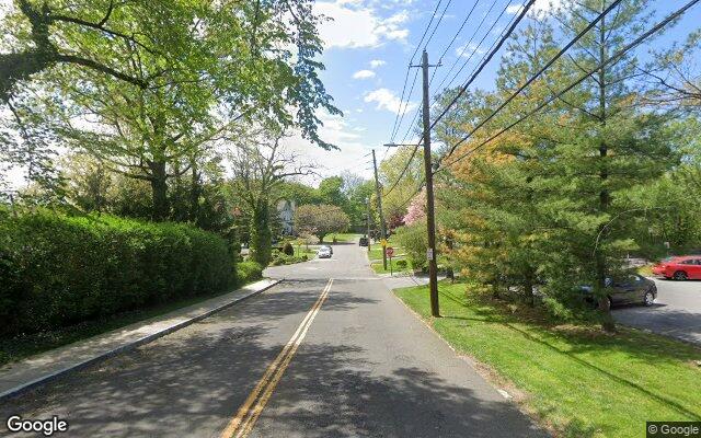 A leafy residential street in the north end of New Rochelle, NY
