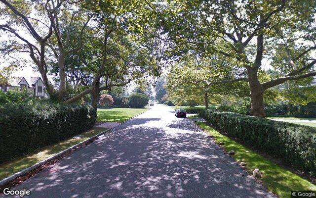 A tree lined street of older homes off Lawrence Lane in Bay Shore