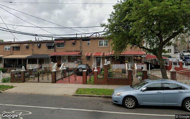 Attached brick rowhouses on Saratoga Avenue in Brownsville, Brooklyn