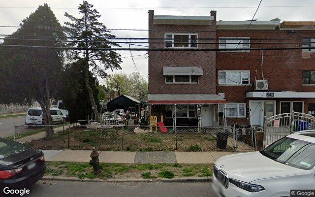 A semi detached brick three family house on Lacombe Avenue in Castle Hill, Bronx