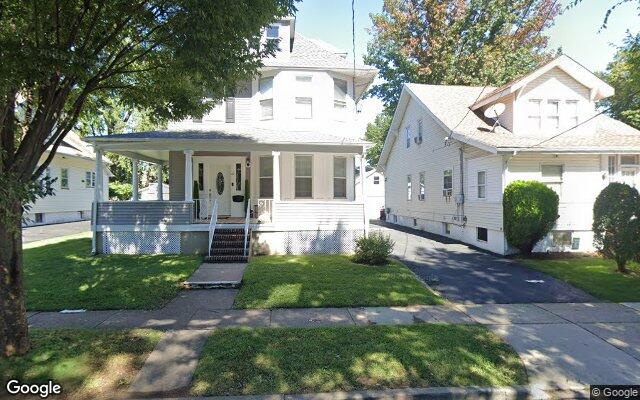 A colonial with a wraparound porch on Clinton Avenue in Clifton, NJ