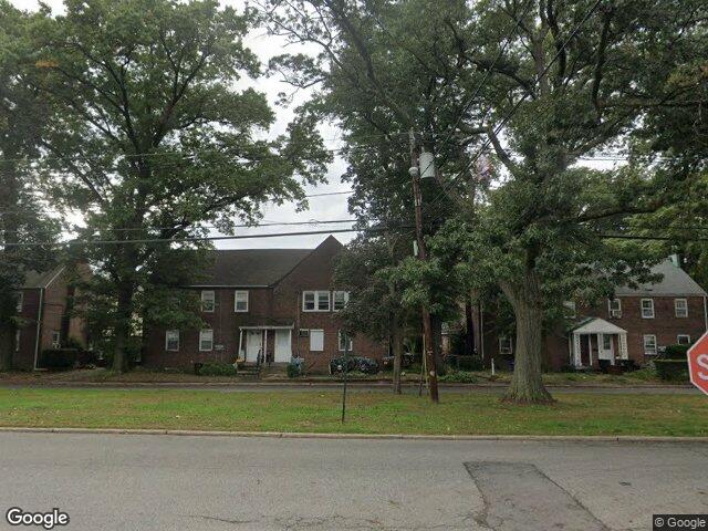 Brick Radburn homes under mature oaks on Burnham Place in Fair Lawn, NJ