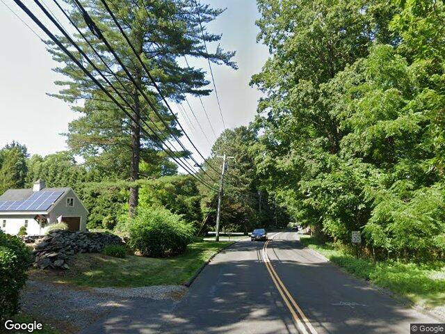Stone wall and pines on Bronson Road in Greenfield Hill, Fairfield, CT