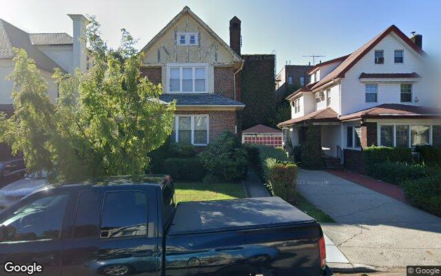 A brick Tudor and a frame colonial on East 21st Street in Flatbush, Brooklyn
