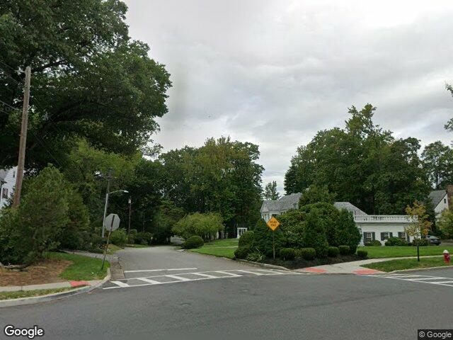 Colonial homes on a tree lined corner of Fairmount Avenue in Hackensack, NJ