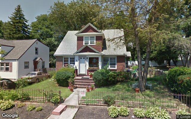 We buy houses in Huntington Station, NY A brick and shingle cape on East 9th Street in Huntington Station