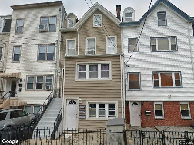 A three family frame house on Ogden Avenue in the Jersey City Heights