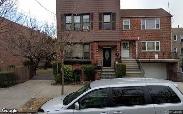 A brick two family house on Lurting Avenue in Morris Park, Bronx