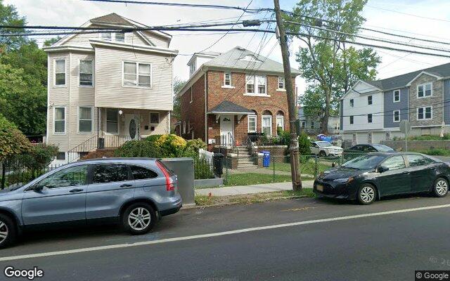We buy houses in Paterson, NJ A frame three family beside a brick two family on Totowa Avenue in Paterson, NJ