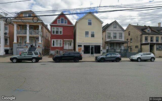 Frame two and three family houses on Brighton Avenue in Perth Amboy, NJ