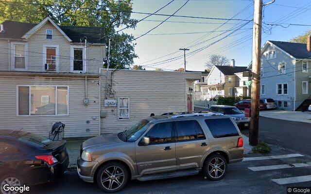Older frame two family houses on Grove Avenue in Port Richmond, Staten Island