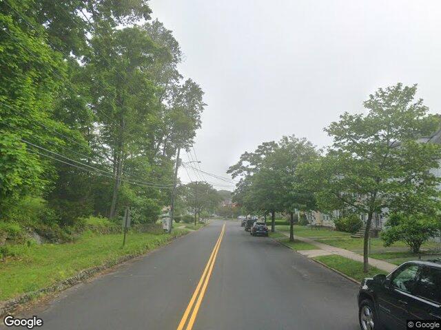 Tree lined Savin Avenue in West Haven, CT