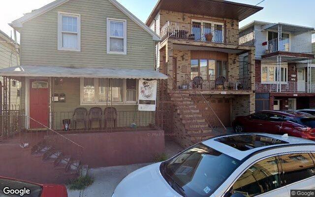 Attached frame houses on Adams Street in West New York, NJ