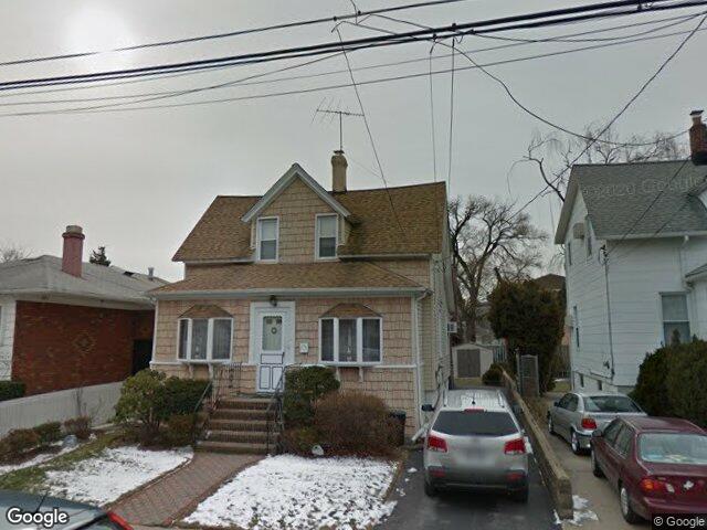 We buy houses in Whitestone, NY A shingled colonial with dormers on 12th Avenue in Whitestone