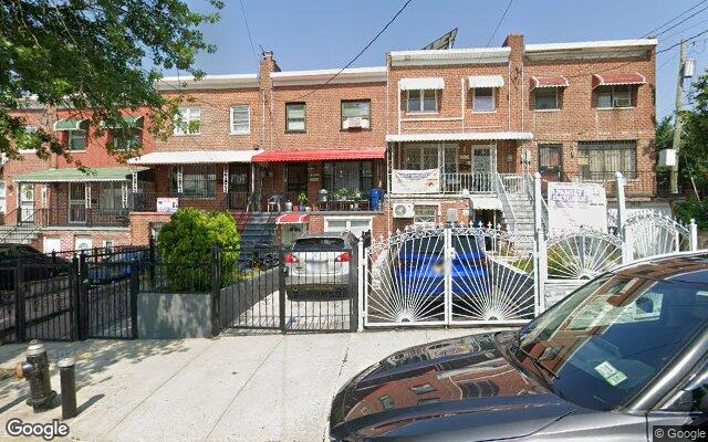 Attached brick two family houses on Paulding Avenue in Williamsbridge, Bronx