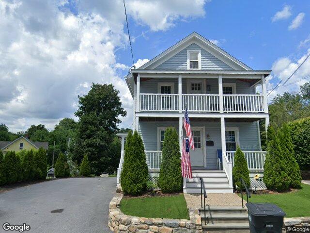 We buy houses in Torrington, CT A two family house with double porches on Brightwood Avenue in Torrington, CT