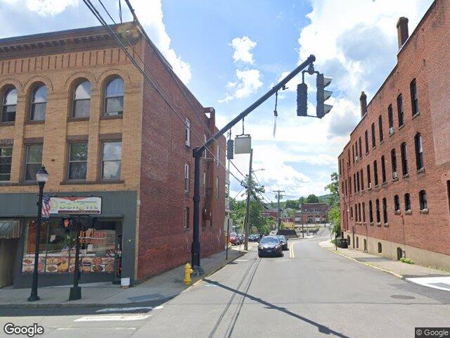 We buy houses in Torrington, CT Brick mixed use blocks on Prospect Street in downtown Torrington, CT